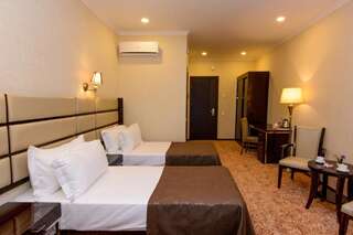 Отель Apart Hotel MX Тбилиси Стандартный номер с 2 односпальными кроватями и диваном-3