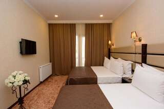 Отель Apart Hotel MX Тбилиси Улучшенный трехместный номер-1