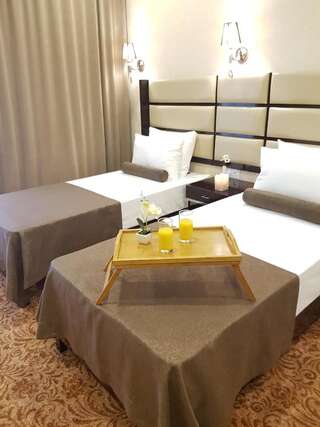 Отель Apart Hotel MX Тбилиси Стандартный номер с 2 односпальными кроватями и диваном-2